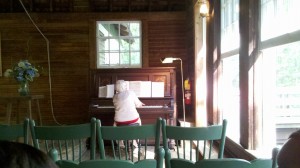 Little Brown Church lady at piano